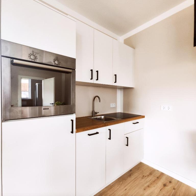 Kuchyň nebo kuchyňský kout v ubytování Garten-Apartment Wurzinger