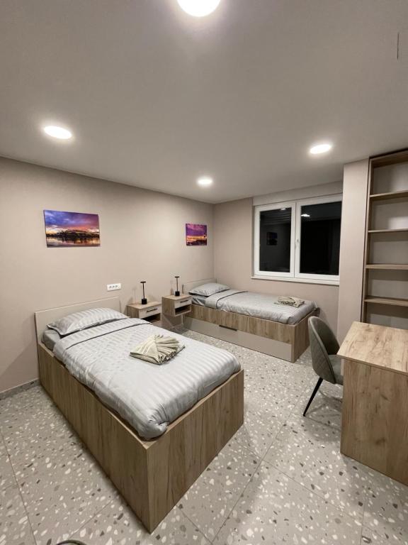 Postel nebo postele na pokoji v ubytování Hostel Novi Sad