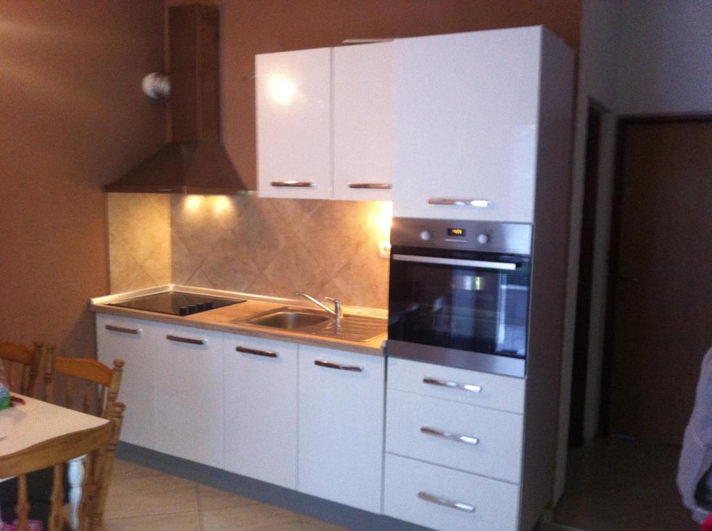 Kuchyňa alebo kuchynka v ubytovaní Apartments Salamun