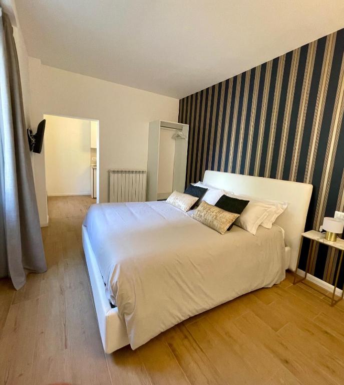 Postel nebo postele na pokoji v ubytování Hotel Baia di Paré