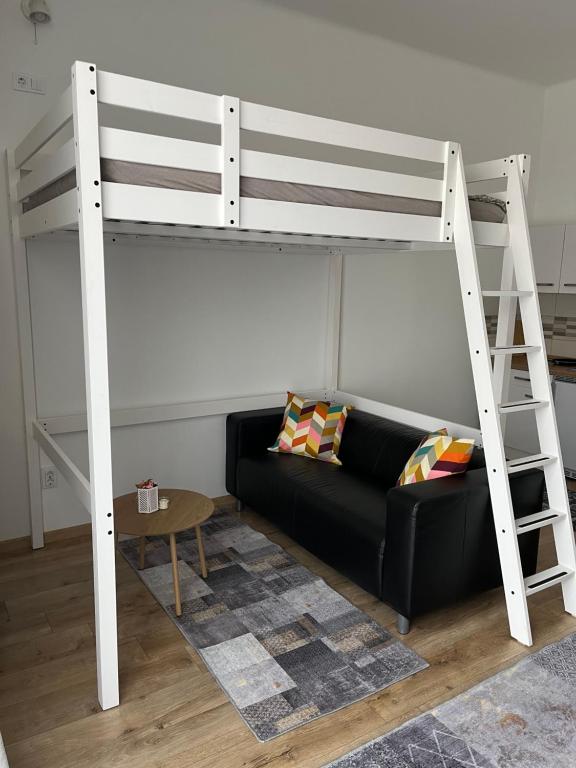 Postel nebo postele na pokoji v ubytování Pullman Apartman