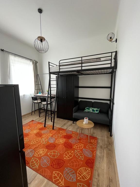 Postel nebo postele na pokoji v ubytování Pullman Apartman