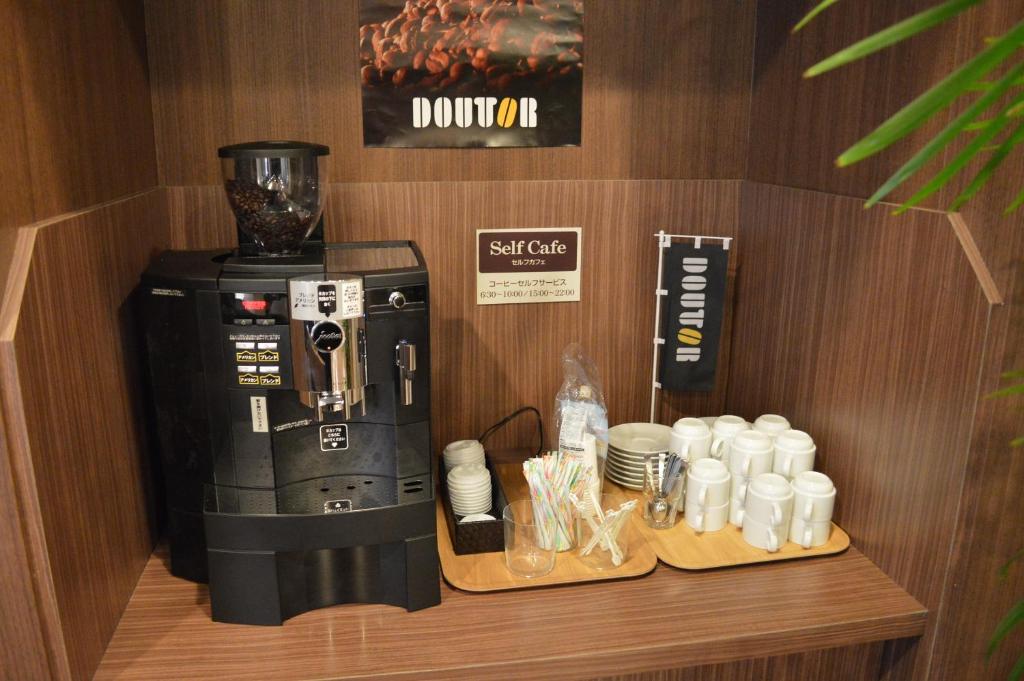 Příslušenství pro přípravu čaje a kávy v ubytování Hotel Route Inn Ise