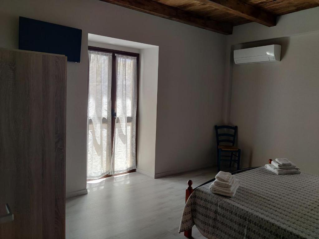 Postel nebo postele na pokoji v ubytování Casa Vacanze Mannara