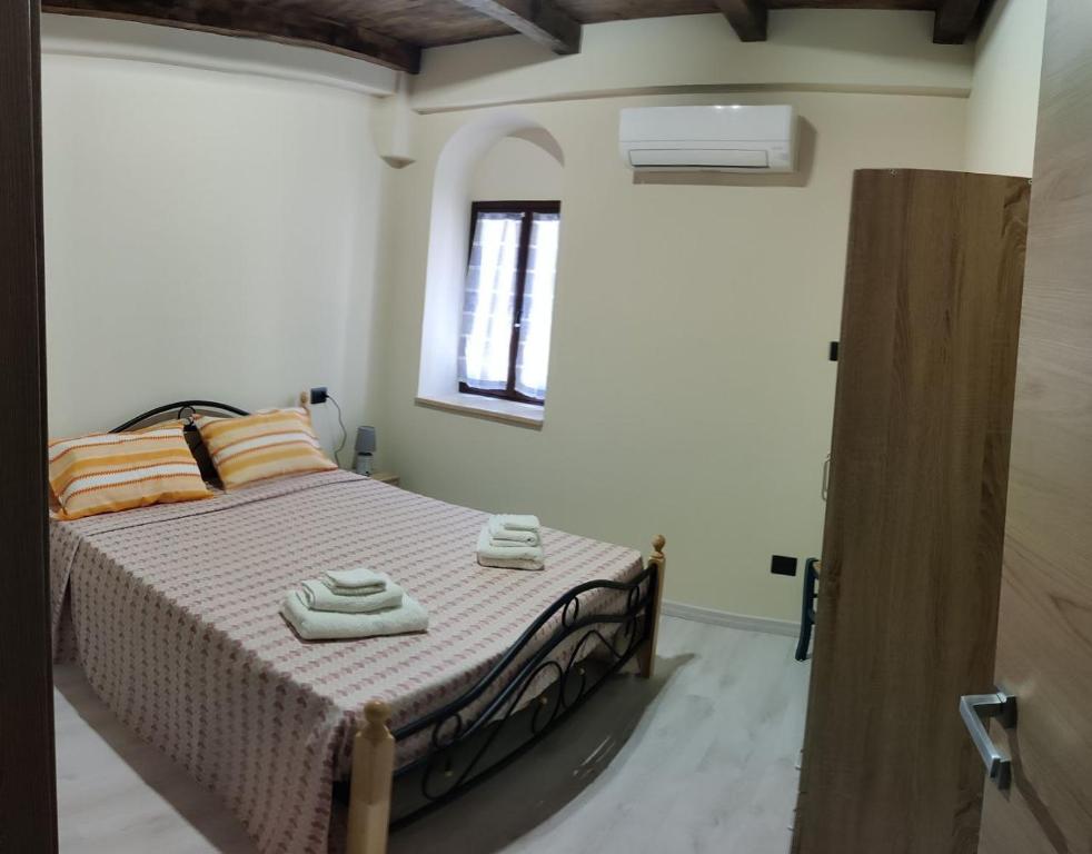 Postel nebo postele na pokoji v ubytování Casa Vacanze Mannara