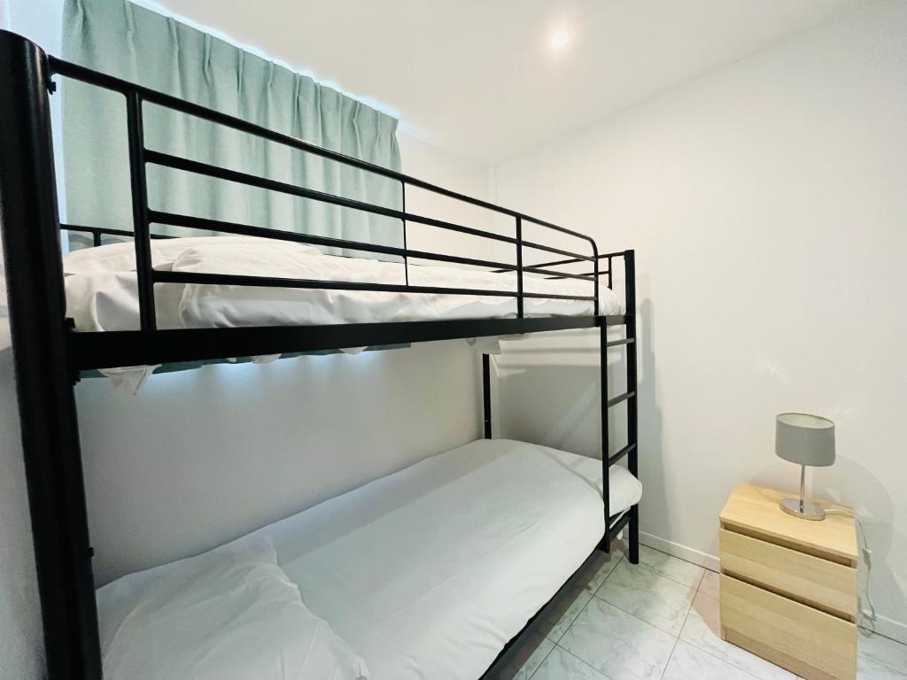 Postel nebo postele na pokoji v ubytování Brasilia Hôtel