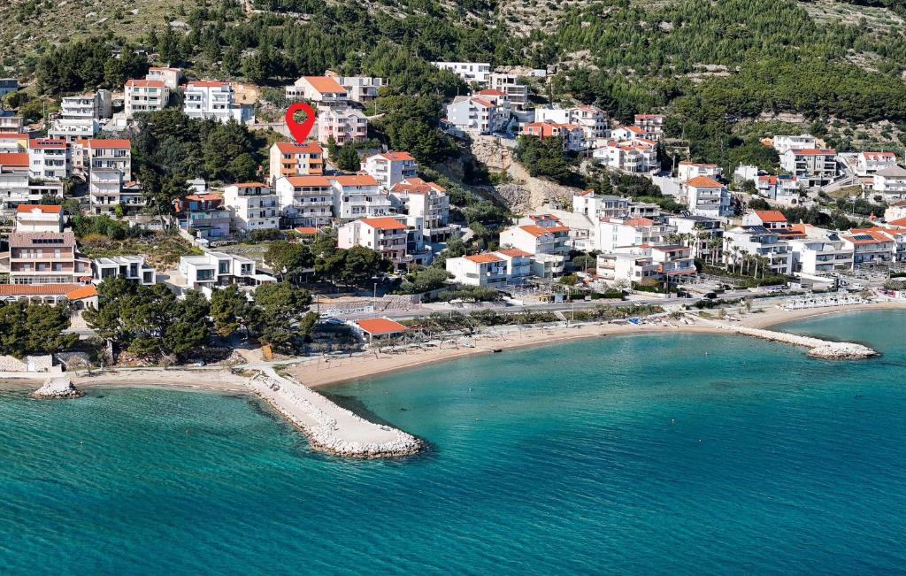 an aerial view of a beach with buildings and the ocean at 1 Bedroom Amazing Apartment In Duce in Duće