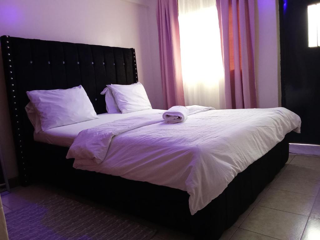 Voodi või voodid majutusasutuse BNB IN KISUMu toas