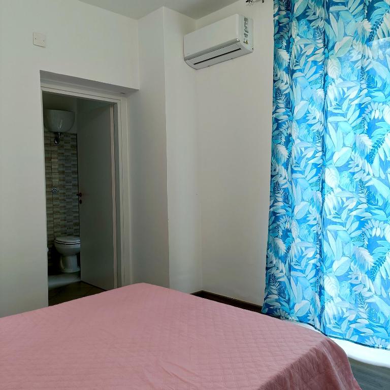 Postel nebo postele na pokoji v ubytování Life Home