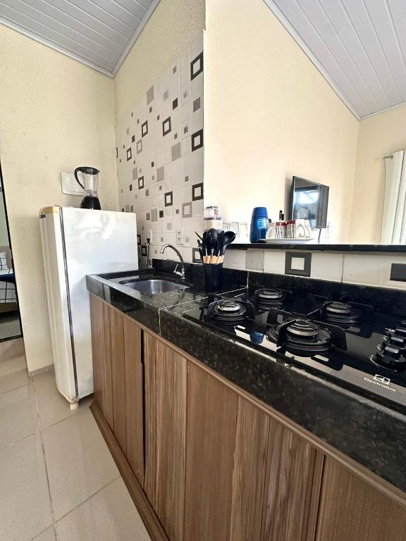 A cozinha ou kitchenette de Residencial Davisis - Parada do Jalapão