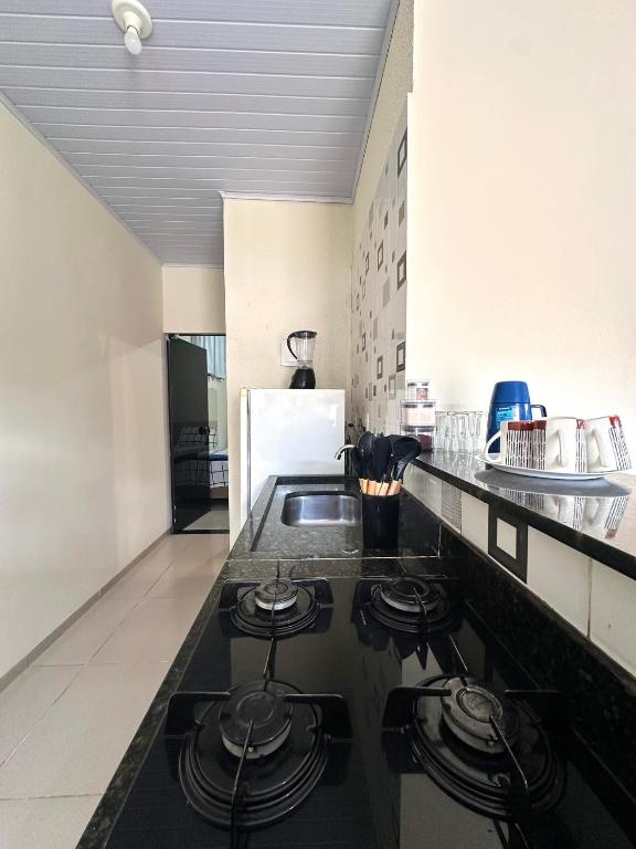 A cozinha ou kitchenette de Residencial Davisis - Parada do Jalapão