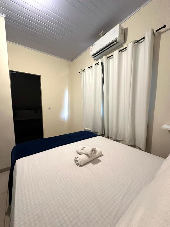 Uma cama ou camas num quarto em Residencial Davisis - Parada do Jalapão