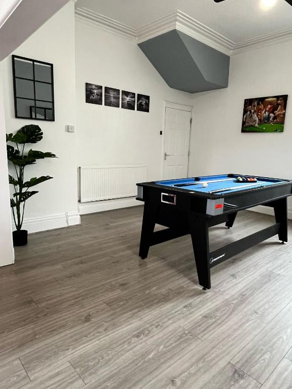a room with a pool table in it at Entire Manor Grove Blackpool in Blackpool
