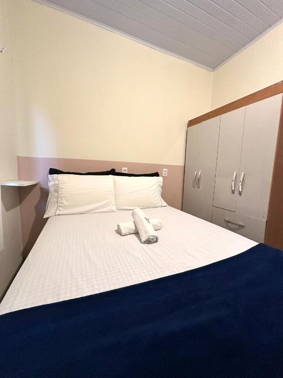 Uma cama ou camas num quarto em Residencial Davisis - Parada do Jalapão