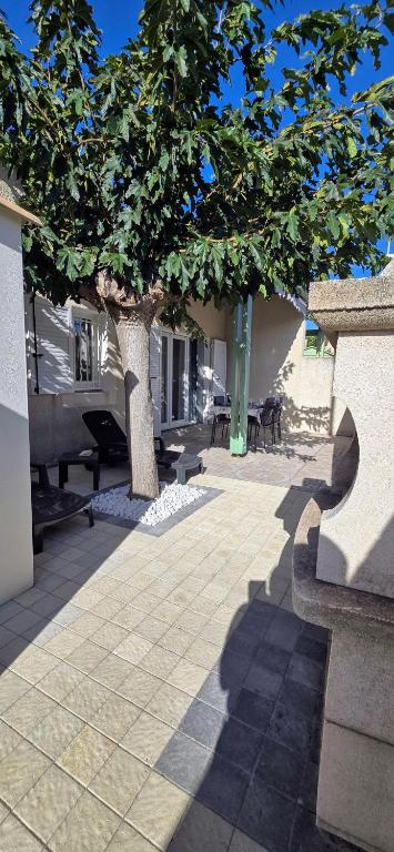 Fotografia z galérie ubytovania LAVANDINES I Joli T3 villa mitoyenne piscine proche plage Rochelongue Cap d'Agde v destinácii Cap d'Agde