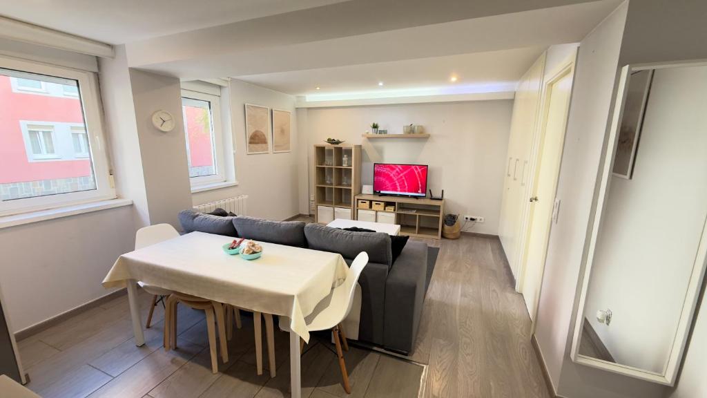 TV a/nebo společenská místnost v ubytování Avenida de Arteixo. Precioso apartamento