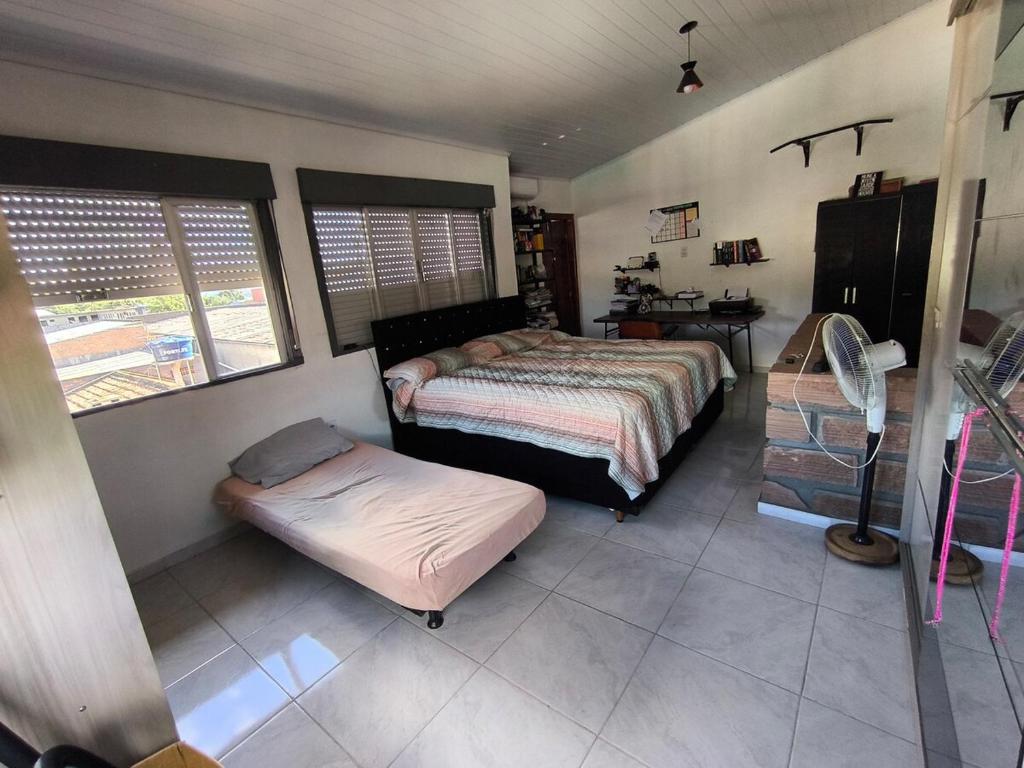 En eller flere senge i et værelse på Sobrado entrada da Cidade