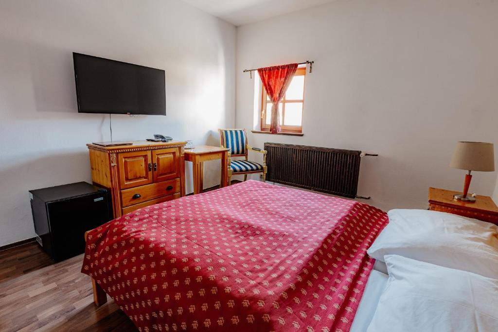 Postel nebo postele na pokoji v ubytování Chateau Krakovany