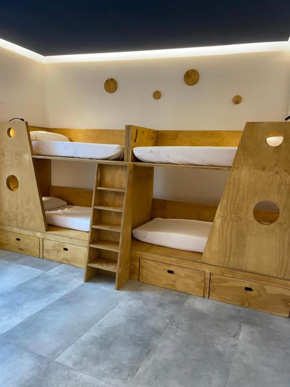Postel nebo postele na pokoji v ubytování Hotel Paola