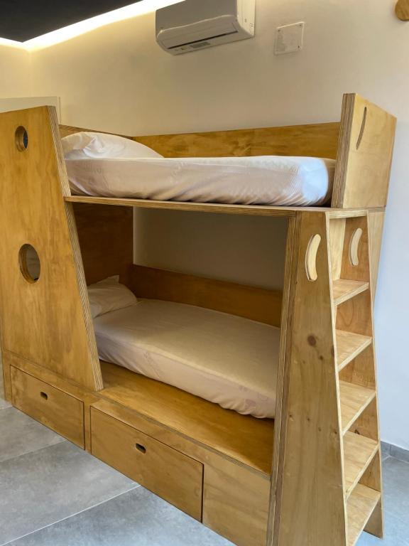 Postel nebo postele na pokoji v ubytování Hotel Paola