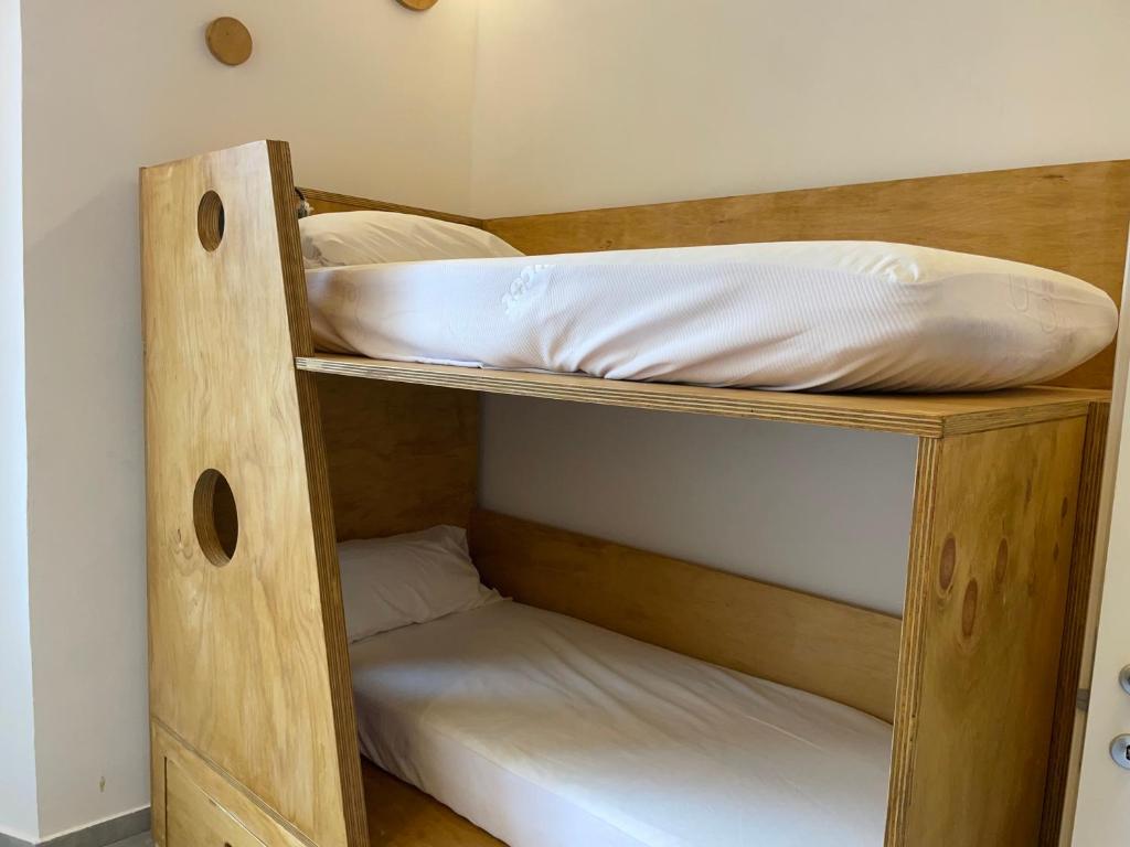 Postel nebo postele na pokoji v ubytování Hotel Paola