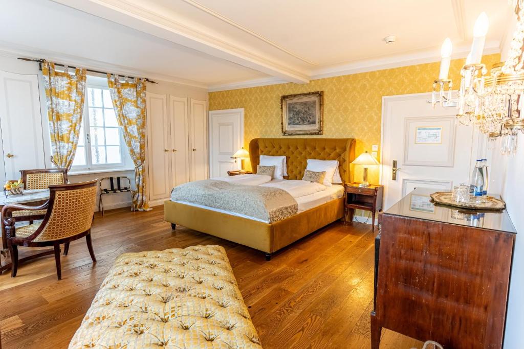 Postel nebo postele na pokoji v ubytování Hotel Porto Sofie Gottlieben