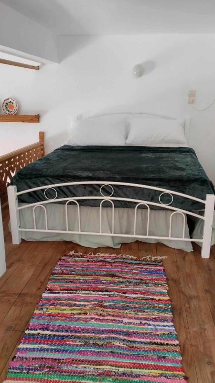 Postel nebo postele na pokoji v ubytování Myrtia Vacation Home