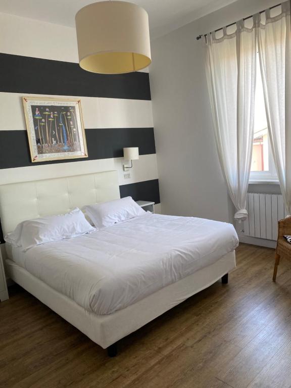 Posteľ alebo postele v izbe v ubytovaní Maison Del Magra
