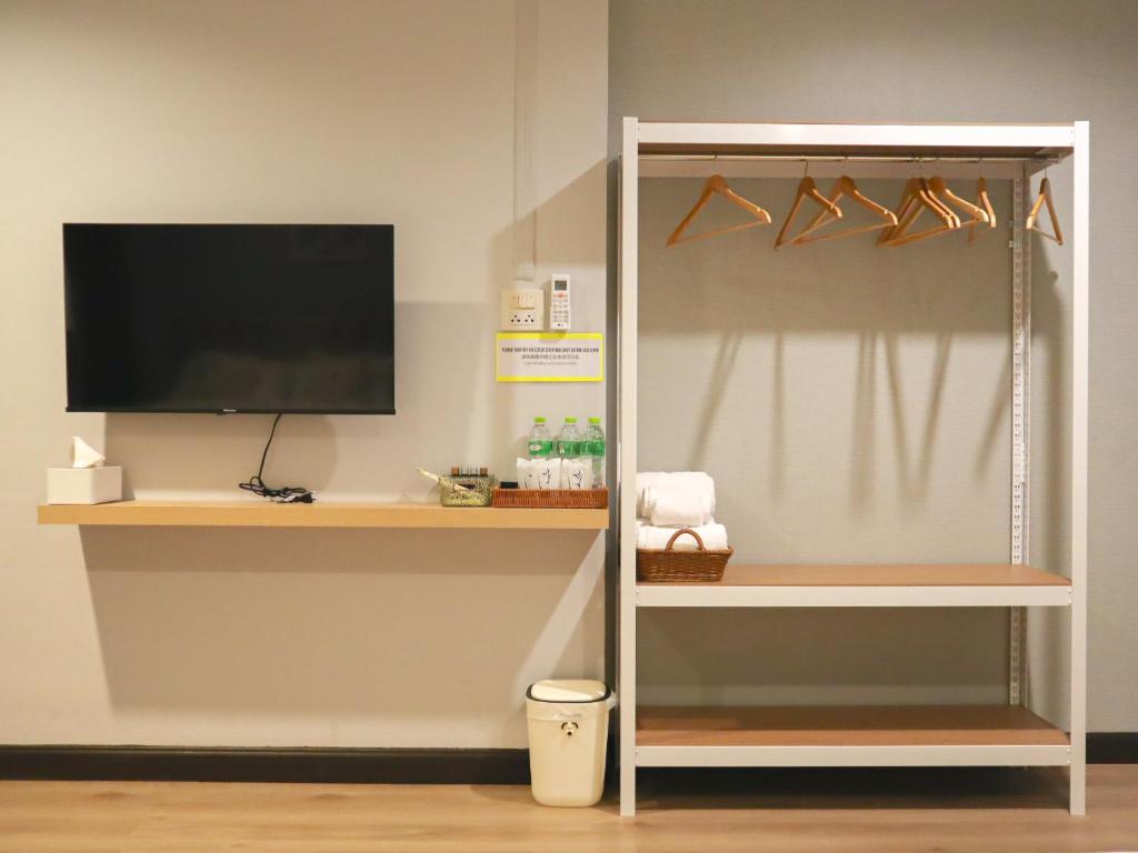 TV a/nebo společenská místnost v ubytování A Little Nap Hometel