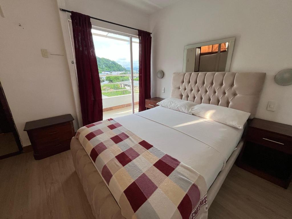 Postel nebo postele na pokoji v ubytování Bahia B&B