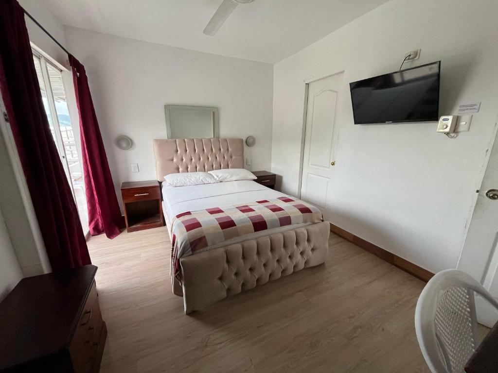 Postel nebo postele na pokoji v ubytování Bahia B&B