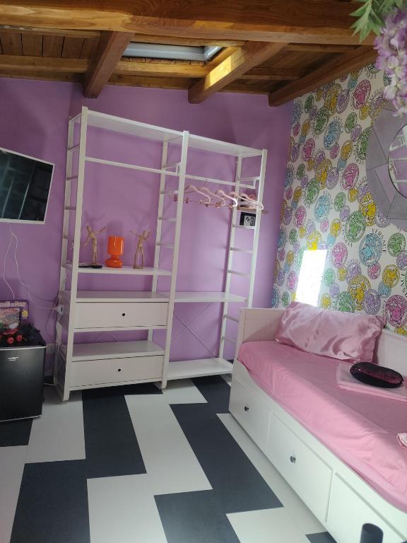 Letto o letti in una camera di Secret Room Anagni