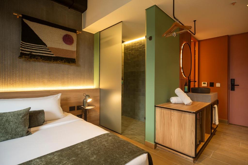 Postel nebo postele na pokoji v ubytování Hunters Hotel