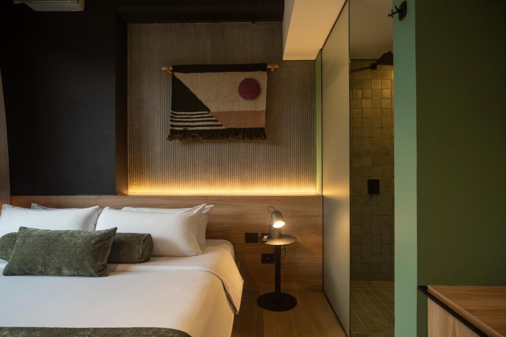 Postel nebo postele na pokoji v ubytování Hunters Hotel