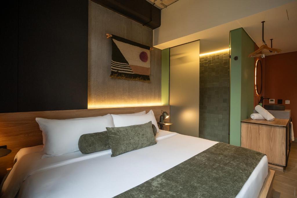 Postel nebo postele na pokoji v ubytování Hunters Hotel