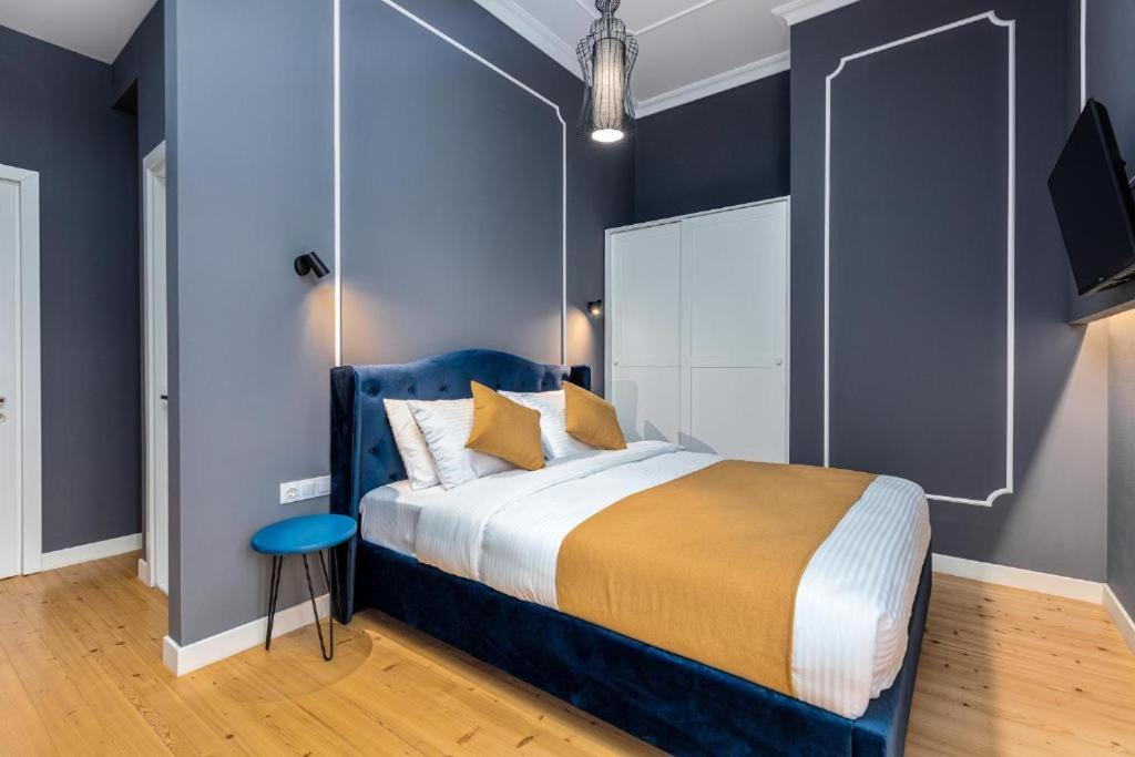 Postel nebo postele na pokoji v ubytování Blue Terrace Hotel