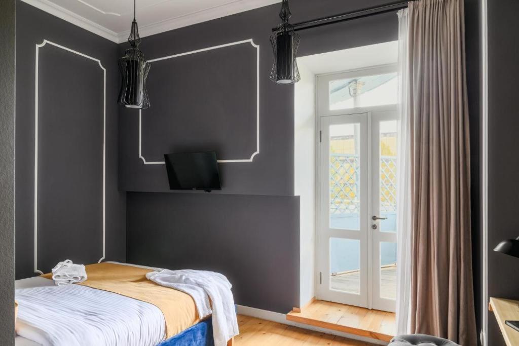 Postel nebo postele na pokoji v ubytování Blue Terrace Hotel
