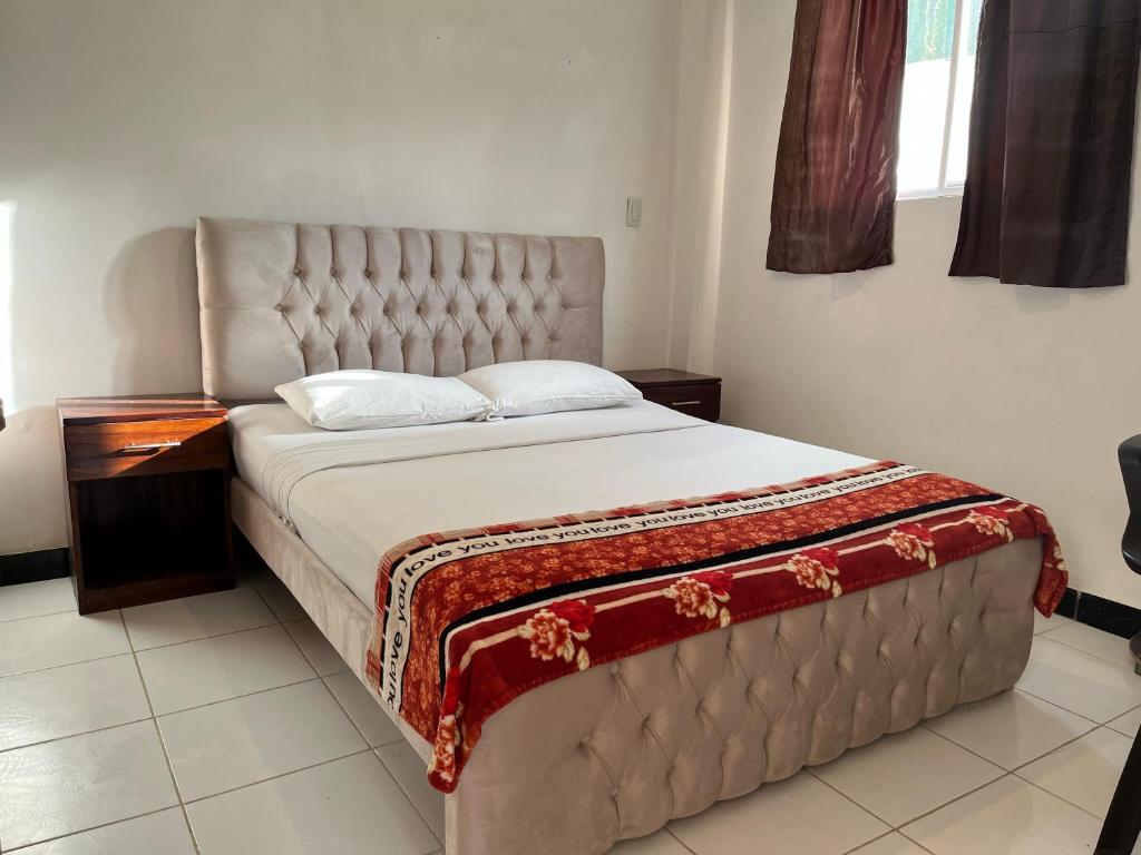 Postel nebo postele na pokoji v ubytování Bahia B&B