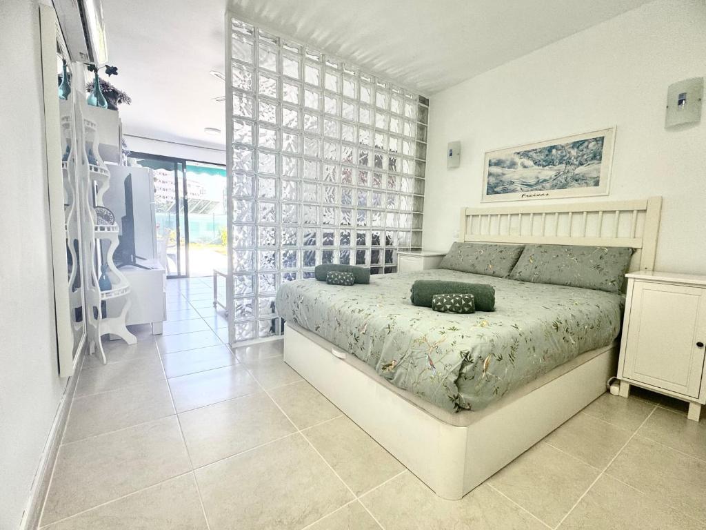 Postel nebo postele na pokoji v ubytování Cozy apartment