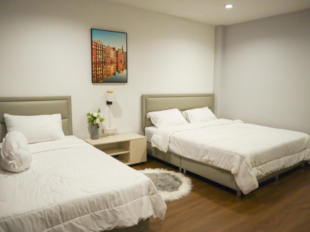 Postel nebo postele na pokoji v ubytování A Little Nap Hometel