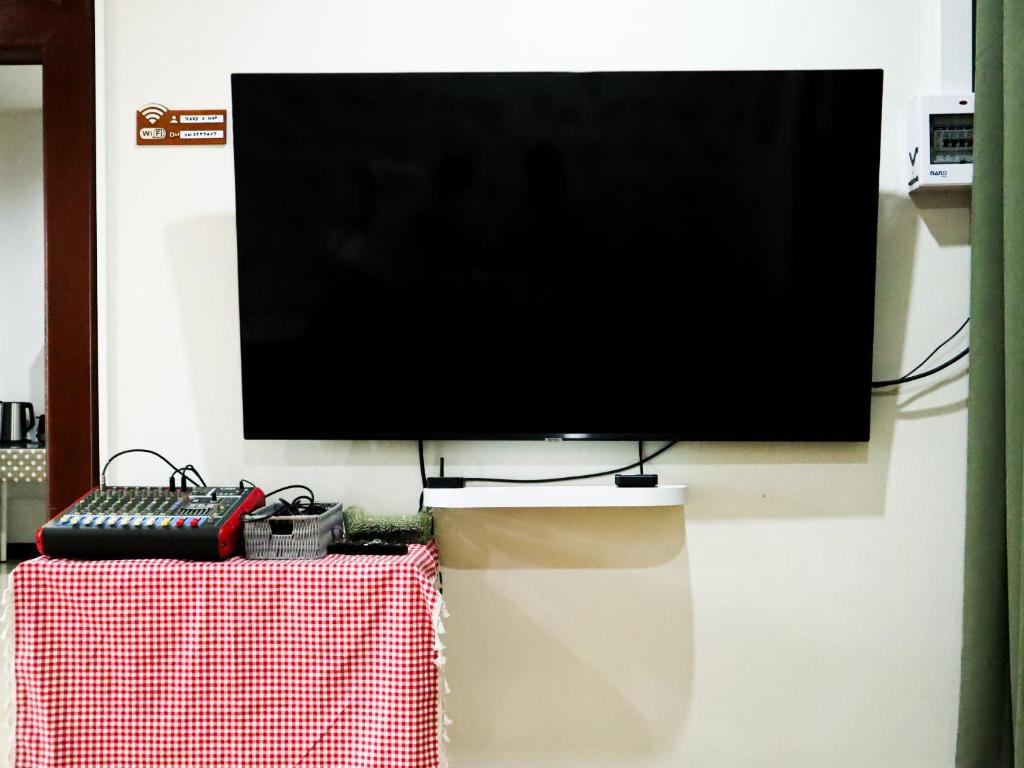 TV a/nebo společenská místnost v ubytování A Little Nap Hometel
