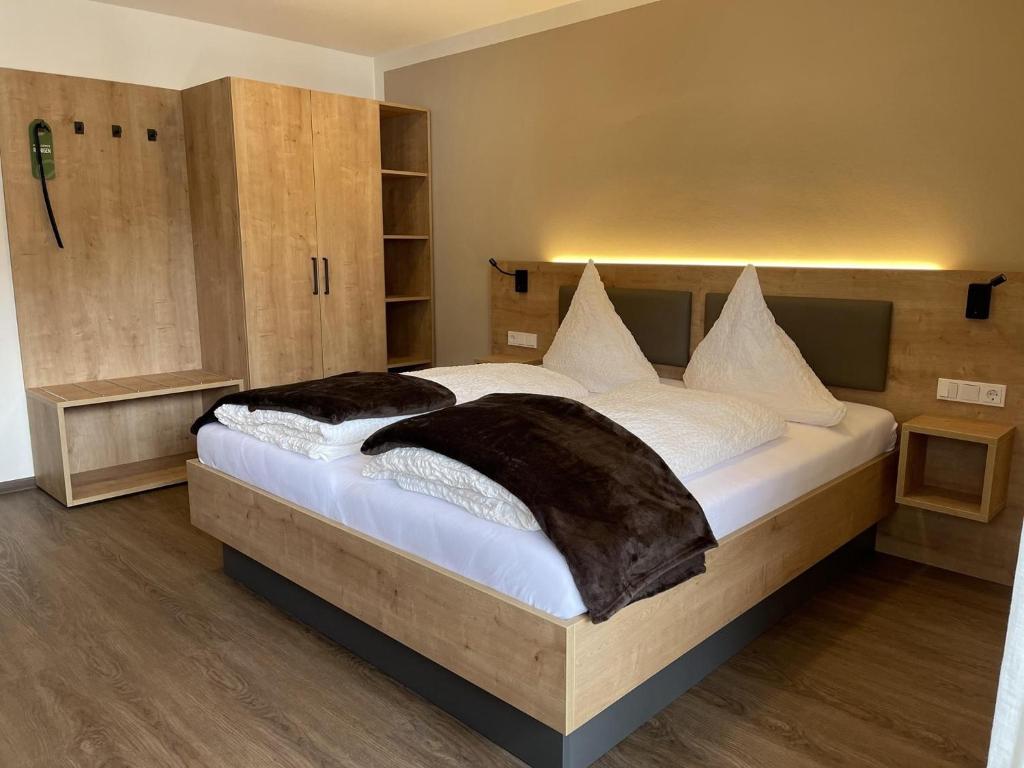 Postel nebo postele na pokoji v ubytování Haus Schatzgarten