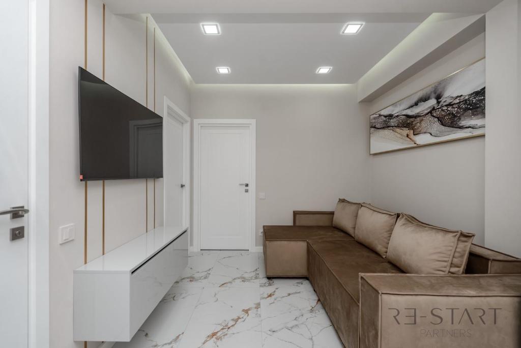 TV i/ili zabavni centar u objektu Luxurious Apartament