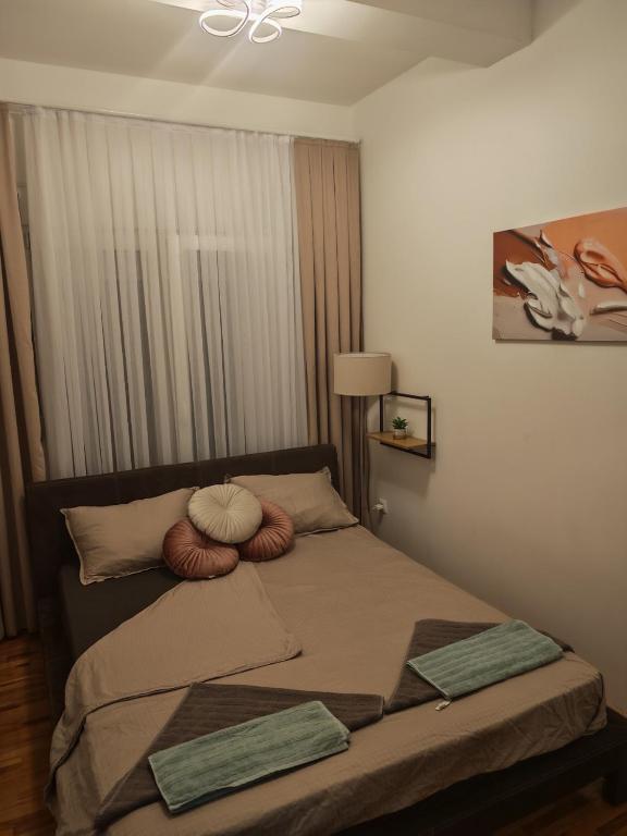 Postel nebo postele na pokoji v ubytování Apartman Golden Crown