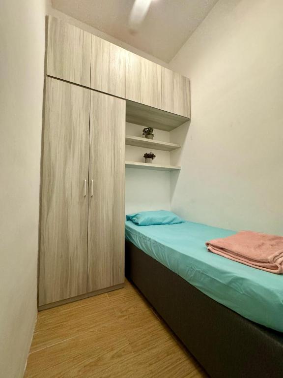 Postel nebo postele na pokoji v ubytování Manhattan Suites ITCC by KinabaluKomfortHomestay - Iverie