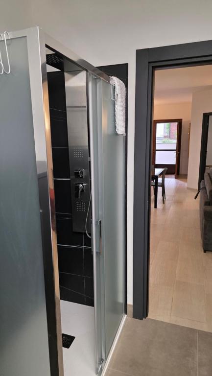 TV a/nebo společenská místnost v ubytování Oltre la Siepe Apartment