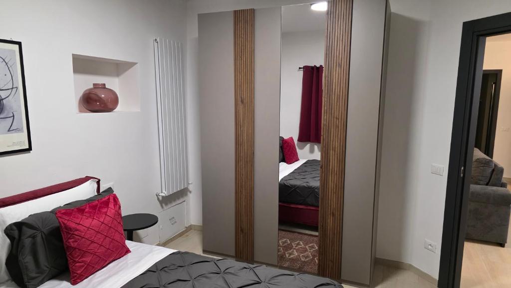 Postel nebo postele na pokoji v ubytování Oltre la Siepe Apartment