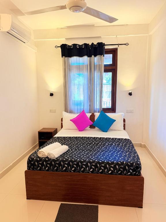 Postel nebo postele na pokoji v ubytování Thisara Luxury Villas