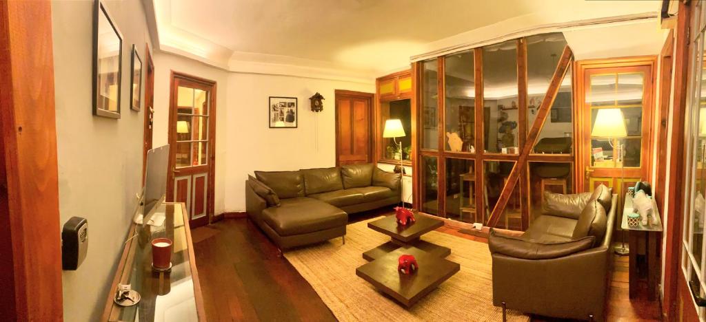 Posezení v ubytování Cozy Place Hostal