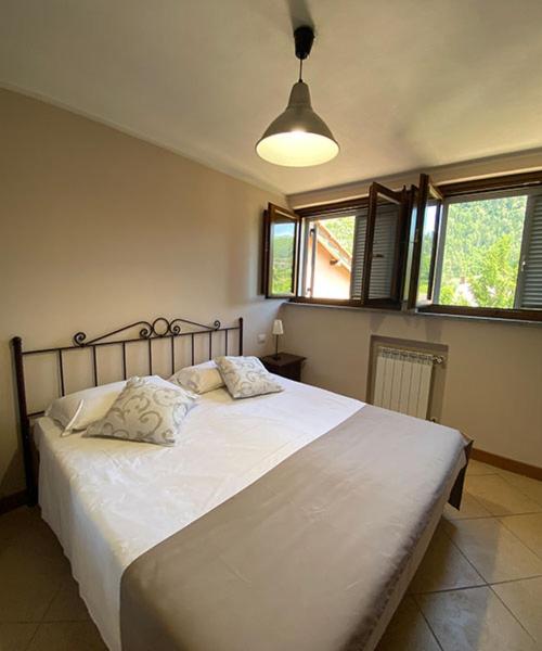 Posteľ alebo postele v izbe v ubytovaní Casa Vacanze La Villetta